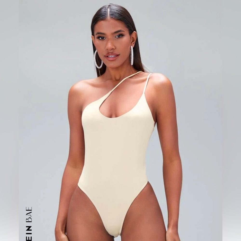 NWT Cross strap body suit